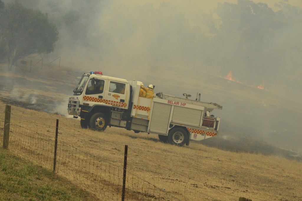 Belair 34P pumps and rolls to contain a running grass fire at the Sampson Flat Fire (Photo Ashley Hosking - CFS promotions unit)